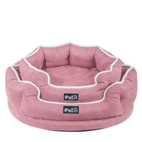 A dog enjoying a restful sleep on our comfortable memory foam bed, ideal for improving pet wellness. Buy for Dog