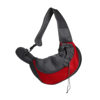 Red sling-style pet carrier for walking with your small dog or cat