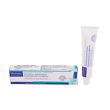 Virbac enzymatic dog toothpaste tube with poultry flavor label displayed. BUY FOR DOG.