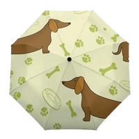 Chic dog print on a durable rain umbrella for adults. BUY FOR DOG