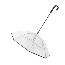 Transparent dog umbrella with built-in leash and black curved handle.