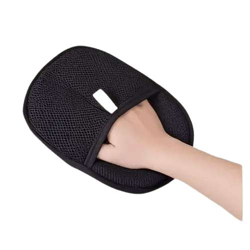 Black double-sided pet hair removal glove used to remove dog and cat hair from furniture