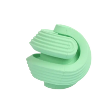 Durable natural rubber dog toy ball designed for long-lasting fun and teeth cleaning, perfect for chewers. Buy for Dog