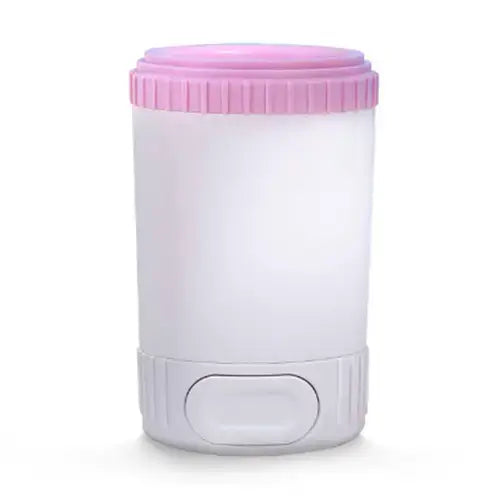 Pink easy dog paw cleaner cup for dogs, gently removes mud, sand, and dirt from paws.