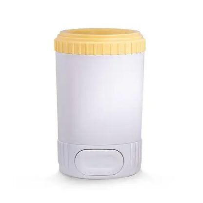 Yellow easy dog paw cleaner cup with soft silicone bristles for cleaning muddy paws.