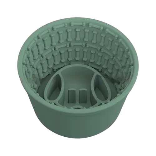 Green silicone slow feeder dog bowl for dogs. Prevents gulping and bloating, non-slip, dishwasher safe.