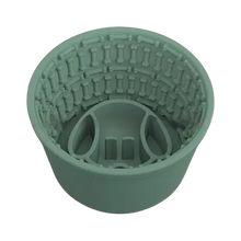 Green silicone slow feeder dog bowl for dogs. Prevents gulping and bloating, non-slip, dishwasher safe.