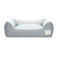 Grey orthopedic cotton dog bed with waterproof base and washable cover, ideal for small dogs and puppies.
