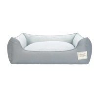 Grey orthopedic cotton dog bed with waterproof base and washable cover, ideal for small dogs and puppies.