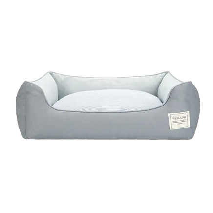 Grey orthopedic cotton dog bed with waterproof base and washable cover, ideal for small dogs and puppies.