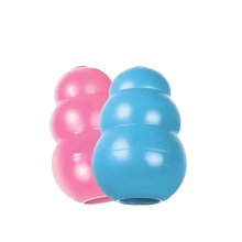 KONG dog toys in pink and blue made from durable natural rubber, ideal chew toys for dogs of all ages and breeds