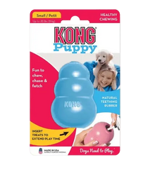Hands filling an interactive KONG puppy chew toy made of natural rubber, ideal for teething relief, dental health, and extended play with treats