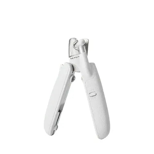 LED nail clipper for pets – safe grooming tool for dogs and cats.