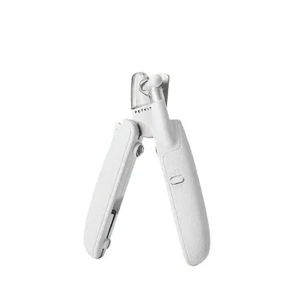 LED nail clipper for pets – safe grooming tool for dogs and cats.