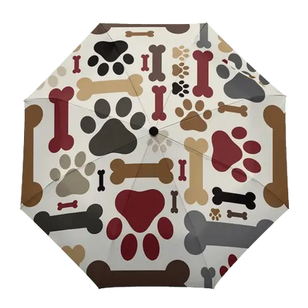 Paw print weather shield umbrella, combining art and utility. BUY FOR DOG