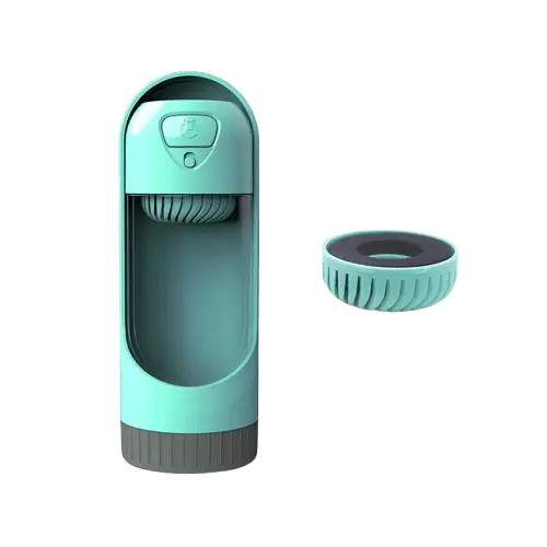 Green portable dog water bottle with charcoal filter for safe hydration.