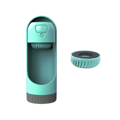 Green portable dog water bottle with charcoal filter for safe hydration.