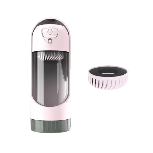 Pink portable dog water bottle with charcoal filter for pets.