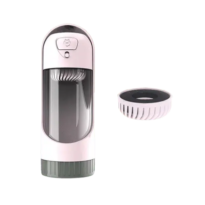 Pink portable dog water bottle with charcoal filter for pets.