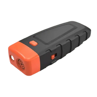 Portable ultrasonic dog barking stopper in black and orange – safe anti-bark training device for dogs.