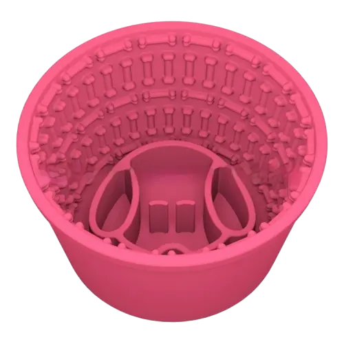 Watermelon pink silicone slow feeder dog bowl for dogs. Anti-gulping and bloat, non-slip base, BPA-free.
