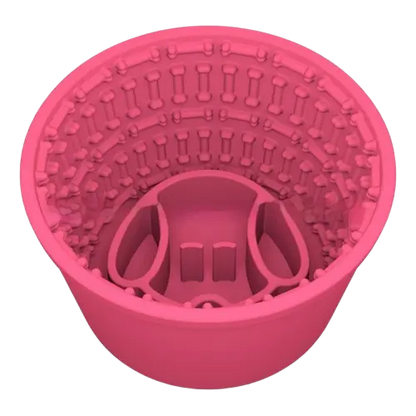 Watermelon pink silicone slow feeder dog bowl for dogs. Anti-gulping and bloat, non-slip base, BPA-free.